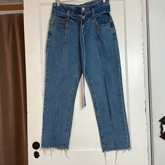 Dolls Kill Momokrom high waisted denim with frayed hem and silver buckle belt. - Picture 1 of 14